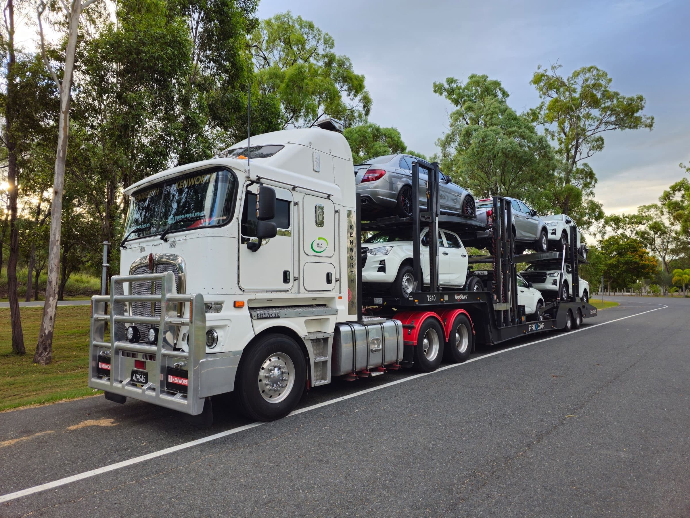 A car carrier loaded with cars on the road