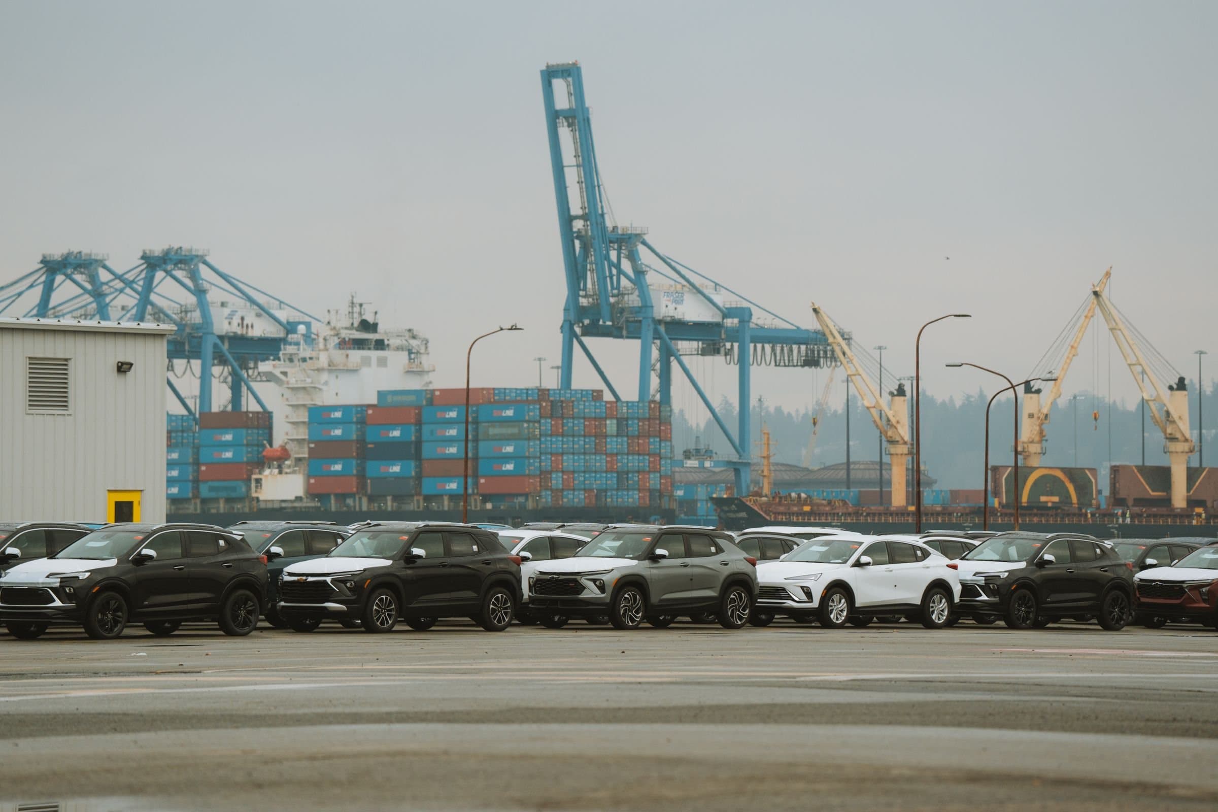 New cars lined up for export at a container port